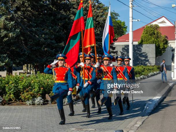 The PMR Honour Guard march towards the Memorial of Military Glory for a flower laying ceremony on Republic Day on September 2, 2023 in Tiraspol,...