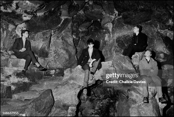 English post-punk group Echo And The Bunnymen photographed in Liverpool in 1981. Left to right: drummer Pete de Freitas, singer Ian McCulloch,...