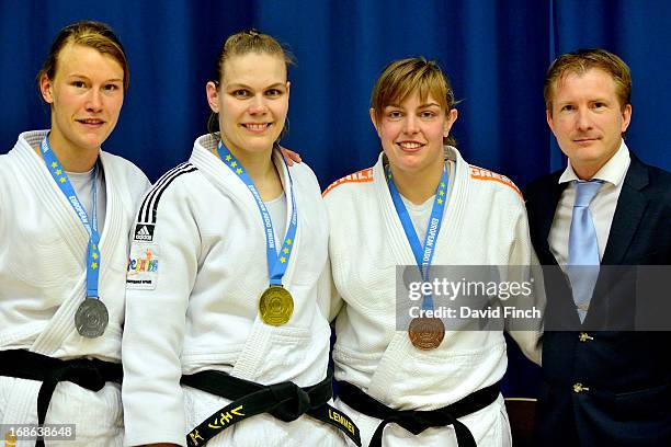 Under 78kgs medallists : Silver: Linda Boers , Gold: Iris Lemmen , Bronze: Martine Demkes along with the EJU's Media manager, Hans van Essen of...