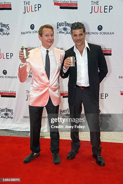 Television Personality/Fashion Designer Carson Kressley and John Guerrera attends the Julep Ball 2013 during the 139th Kentucky Derby at KFC YUM!...