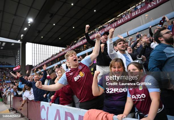 Fans of Aston Villa celebrate during the Premier League match between Aston Villa and Crystal Palace at Villa Park on September 16, 2023 in...
