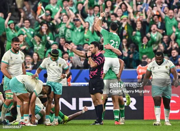 Paris , France - 23 September 2023; Referee Ben O'Keeffe blows the full-time whistle as Conor Murray of Ireland celebrates during the 2023 Rugby...