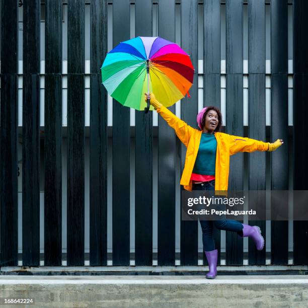 singing in the rain - multi colored boot stock pictures, royalty-free photos & images