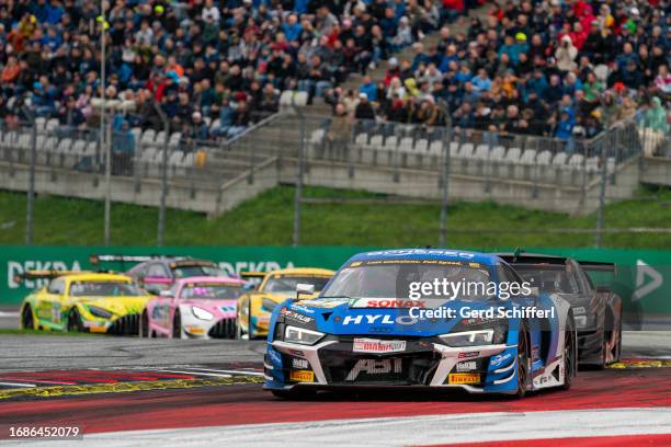 Ricardo Feller from Switzerland in his Audi R8 LMS EVO II GT3 by Team ABT Sportsline in front of the field during the DTM race 2 at Red Bull Ring on...