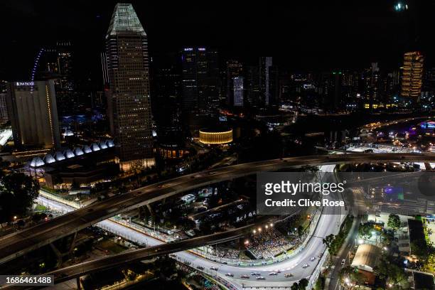 General view of the cars on track at the start of the race during the F1 Grand Prix of Singapore at Marina Bay Street Circuit on September 17, 2023...