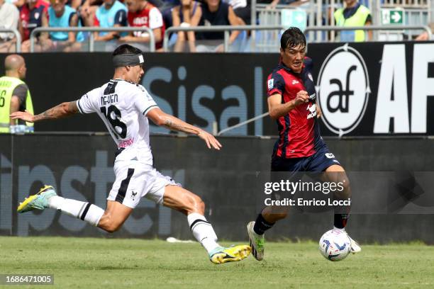 Eldor Shomurodov of Cagliari in contrast during the Serie A TIM match between Cagliari Calcio and Udinese Calcio at Sardegna Arena on September 17,...