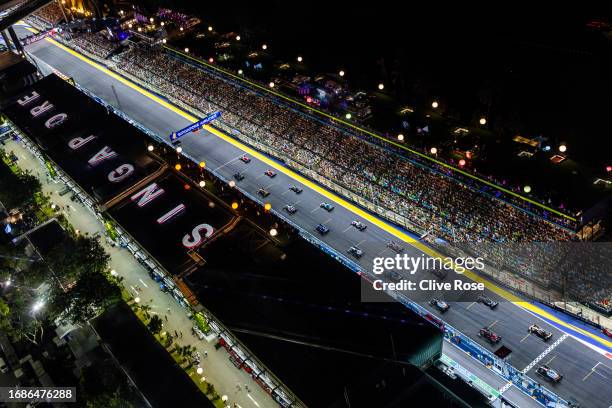 General view as cars leave the grid at the start of the race during the F1 Grand Prix of Singapore at Marina Bay Street Circuit on September 17, 2023...
