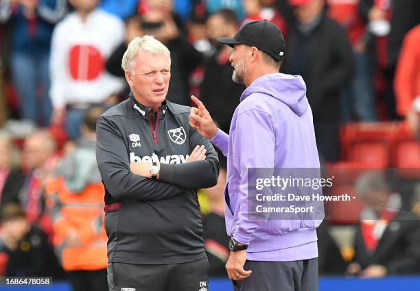 Liverpool's Manager Jurgen Klopp and West Ham United's Manager David Moyes before the Premier League match between Liverpool FC and West Ham United...