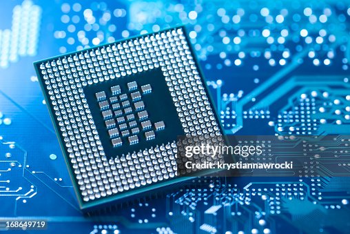 Microprocessor lying on circuit board Microprocessor lying on circuit board