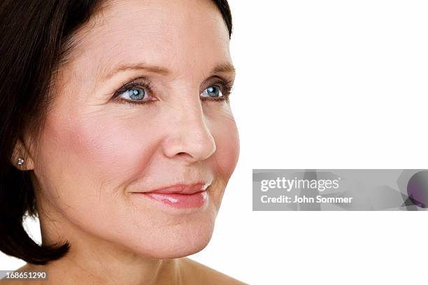 beauty concept for mature woman - looking around on white background stock pictures, royalty-free photos & images