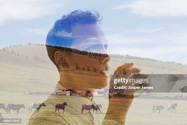 double exposure of a young man and rural backgroun - james hale stock pictures, royalty-free photos & images