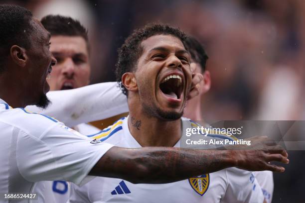 Georginio Rutter of Leeds United celebrates after scoring the team's third goal during the Sky Bet Championship match between Millwall and Leeds...