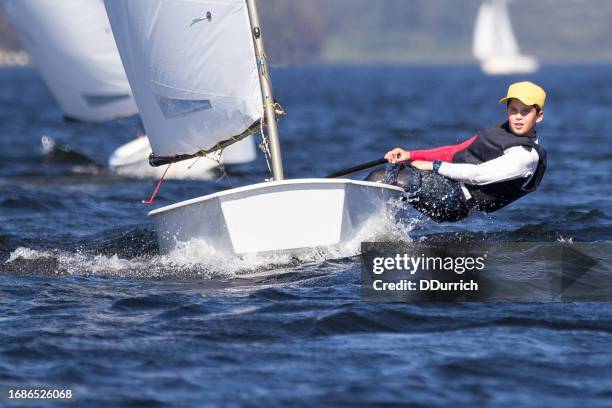 boy sailing - sailing competition stock pictures, royalty-free photos & images