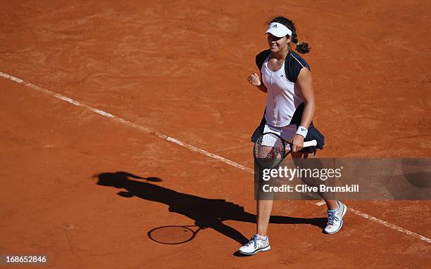 Laura Robson of Great Britain celebrates match point against Venus Williams of the USA in their first round match during day two of the...