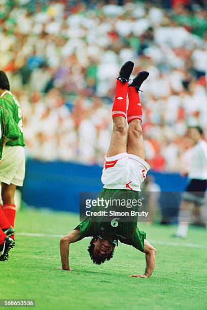 Footballer Hugo Sanchez of Mexico performs a headstand during a Group E match against Norway at RFK Stadium, Washington DC, during the 1994 FIFA...