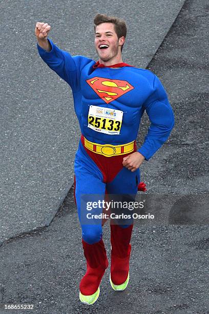 Runner dressed as Superman on Yonge Street south of Davisville Avenue. Runners lace up their sneakers and hit the pavement for the 17th annual...