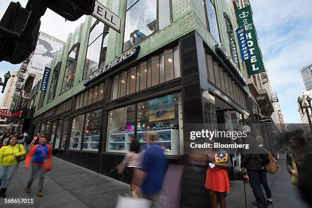 Pedestrians walk past a Skechers U.S.A. Inc. Store in San Francisco, California, U.S., on Friday, May 10, 2013. Skechers U.S.A. Inc. Is expected to...