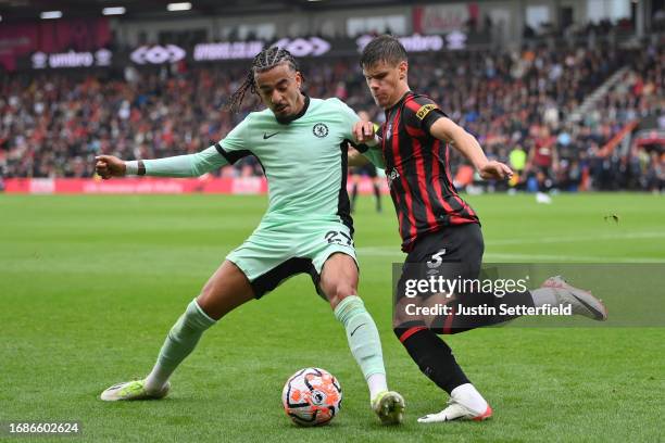 Malo Gusto of Chelsea and Milos Kerkez of AFC Bournemouth battle for possession during the Premier League match between AFC Bournemouth and Chelsea...