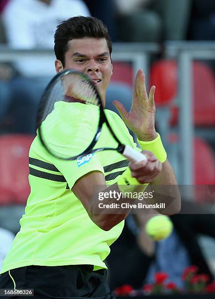 Milos Raonic of Canada plays a forehand against Philipp Kohlschreiber of Germany in their first round match during day two of the Internazionali BNL...