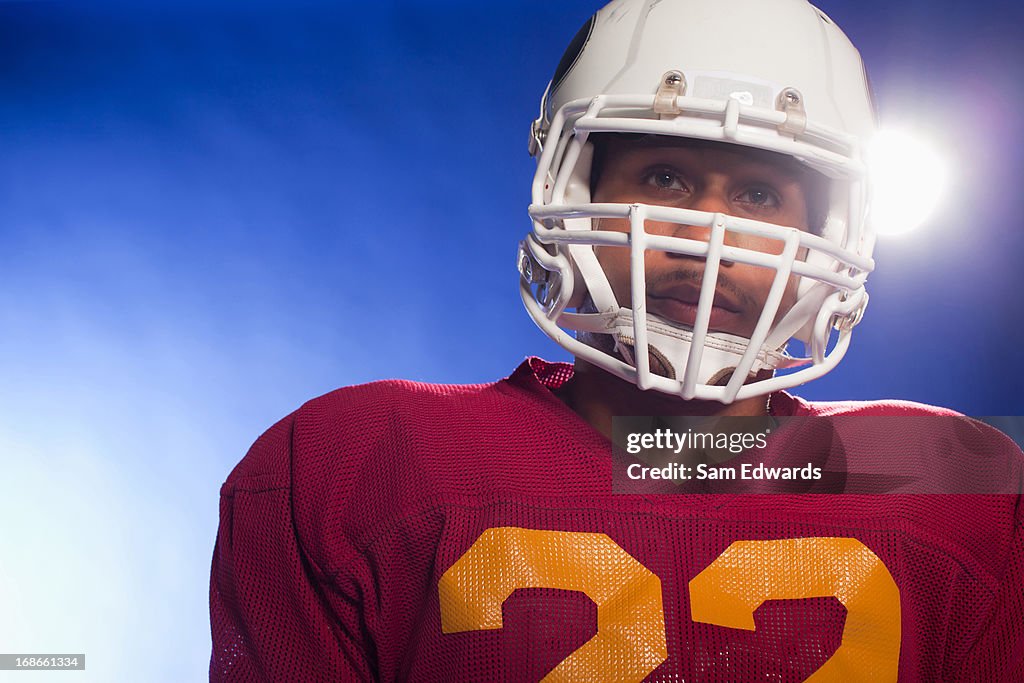 Close up of football player wearing helmet