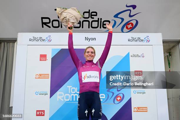 Demi Vollering of The Netherlands and Team SD Worx celebrates at podium as Pink UCI Women’s WorldTour Leader Jersey winner during the 2nd Tour de...