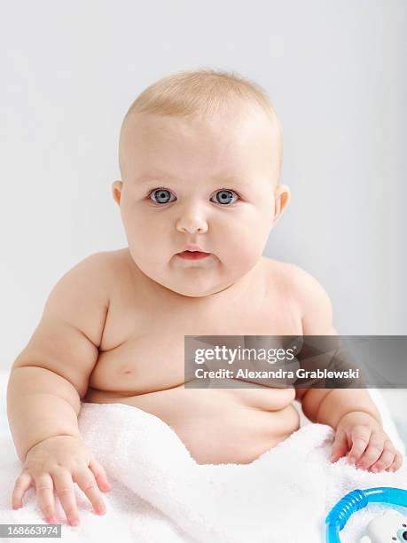 chubby baby in towel - chubby boy fotografías e imágenes de stock