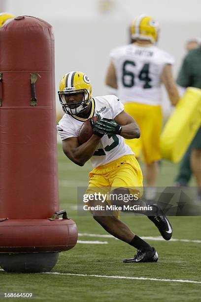 Johnathan Franklin of the Green Bay Packers runs through drills during rookie camp at the Don Hutson Center on May 10, 2013 in Green Bay, Wisconsin.