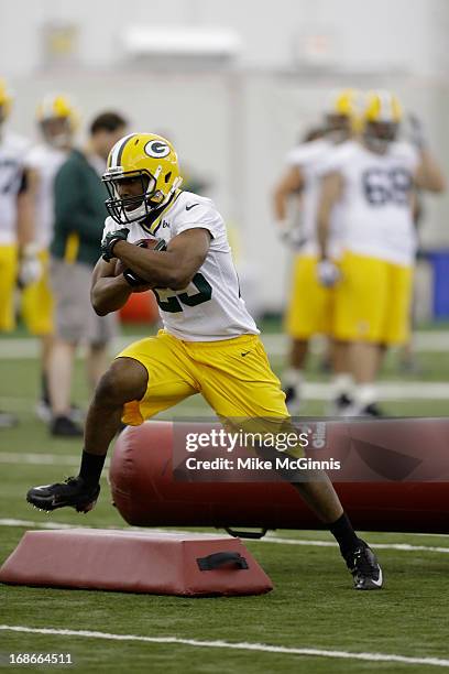 Johnathan Franklin of the Green Bay Packers runs through drills during rookie camp at the Don Hutson Center on May 10, 2013 in Green Bay, Wisconsin.