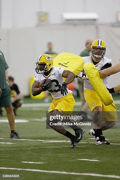 Johnathan Franklin of the Green Bay Packers runs through drills during rookie camp at the Don Hutson Center on May 10, 2013 in Green Bay, Wisconsin.