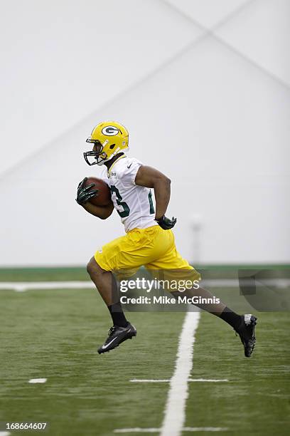 Johnathan Franklin of the Green Bay Packers runs through drills during rookie camp at the Don Hutson Center on May 10, 2013 in Green Bay, Wisconsin.