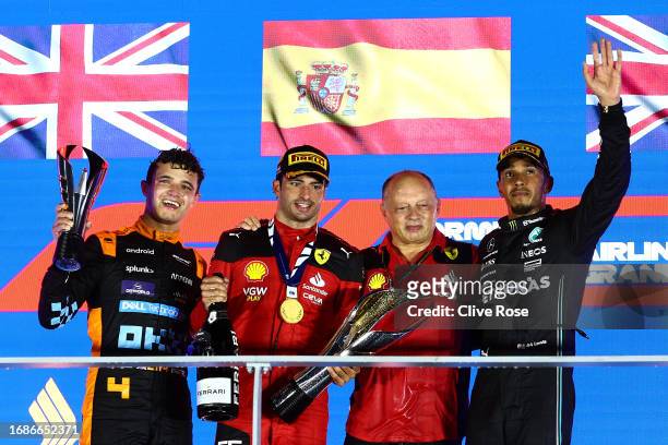Race winner Carlos Sainz of Spain and Ferrari, Second placed Lando Norris of Great Britain and McLaren and Third placed Lewis Hamilton of Great...