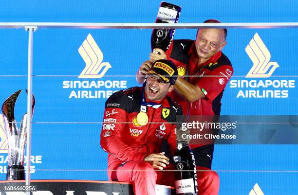 Race winner Carlos Sainz of Spain and Ferrari celebrates with Ferrari Team Principal Frederic Vasseur on the podium during the F1 Grand Prix of...