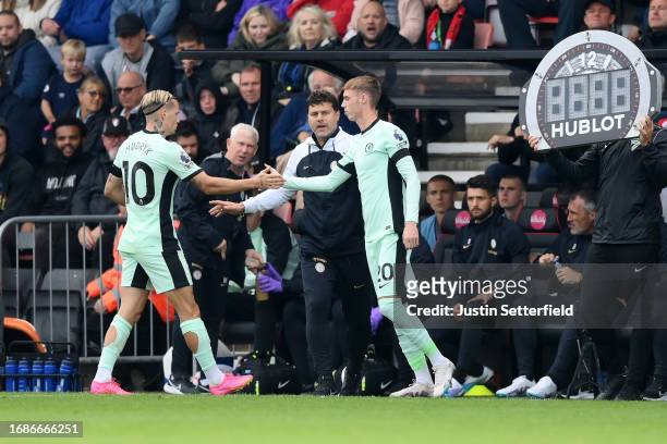 Cole Palmer of Chelsea is substituted on for teammate Mykhaylo Mudryk during the Premier League match between AFC Bournemouth and Chelsea FC at...