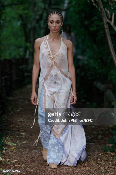Adwoa Aboah walks the runway at the Holzweiler show during London Fashion Week September 2023 at Camley Street Natural Park on September 17, 2023 in...