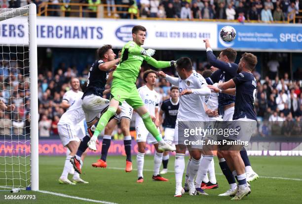 Ilian Meslier of Leeds clears from a corner during the Sky Bet Championship match between Millwall and Leeds United at The Den on September 17, 2023...