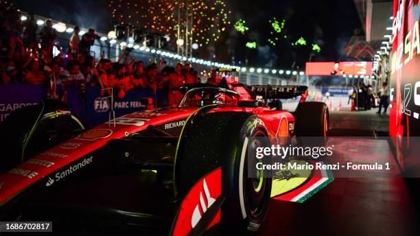 Race winner Carlos Sainz of Spain and Ferrari arrives in parc ferme during the F1 Grand Prix of Singapore at Marina Bay Street Circuit on September...