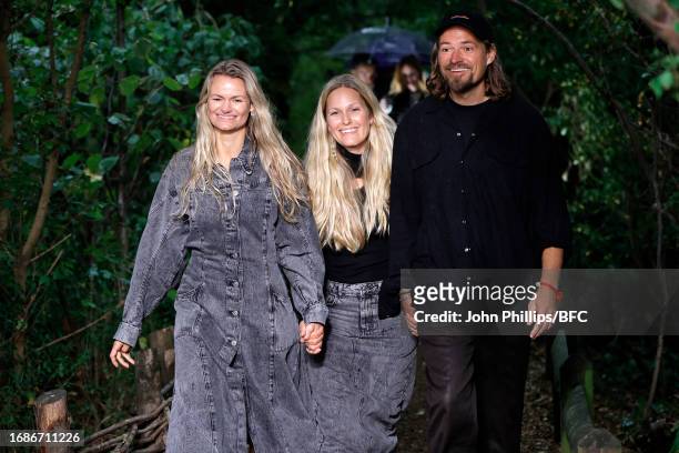 Designers Susanne and Andreas Holzweiler and Creative Director Maria Skappel walks the runway at the Holzweiler show during London Fashion Week...