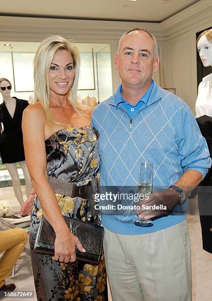 Jennifer Condas and John Condas attend Dior celebrates the opening of Dior Couture Patrick Demarchelier Exhibition at the Dior store at South Coast...