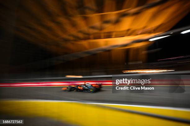 Lando Norris of Great Britain driving the McLaren MCL60 Mercedes on track during the F1 Grand Prix of Singapore at Marina Bay Street Circuit on...