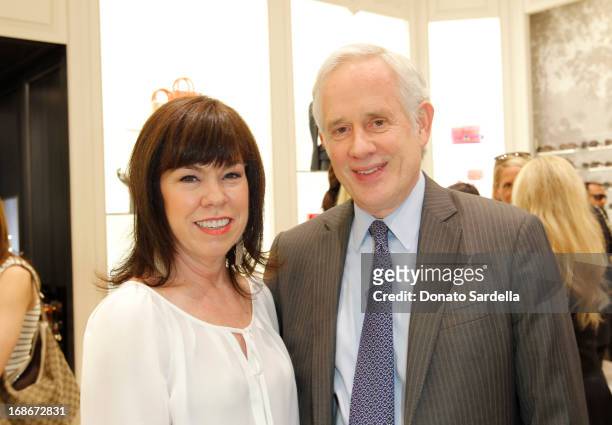 Debra Gunn Downing and David Grant attend Dior celebrates the opening of Dior Couture Patrick Demarchelier Exhibition at the Dior store at South...