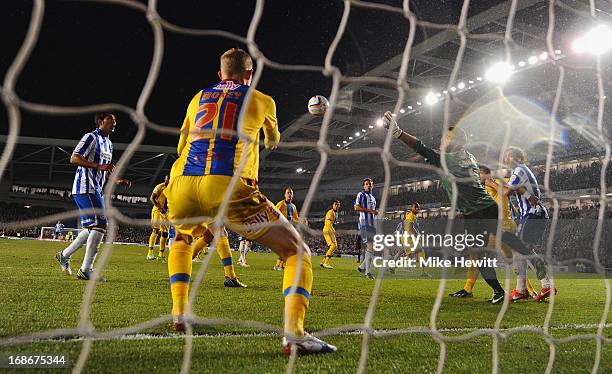 Dean Moxey of Crystal Palace heads an Ashley Barnes effort off the line during the npower Championship Play Off Semi Final Second Leg between...