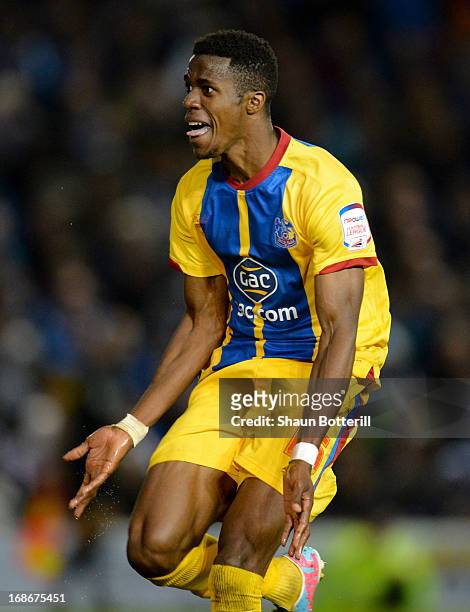 Wilfried Zaha of Crystal Palace celebrates his second goal during the npower Championship play off semi final second leg between Brighton & Hove...