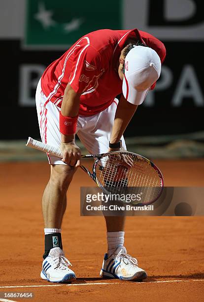 Kei Nishikori of Japan shows his emotions against Paolo Lorenzi of Italy in their first round match during day two of the Internazionali BNL d'Italia...
