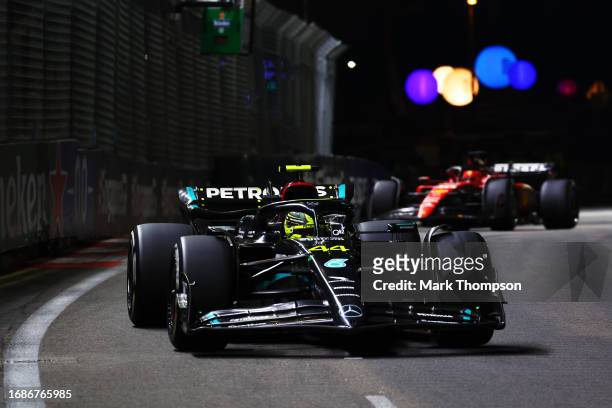 Lewis Hamilton of Great Britain driving the Mercedes AMG Petronas F1 Team W14 on track during the F1 Grand Prix of Singapore at Marina Bay Street...