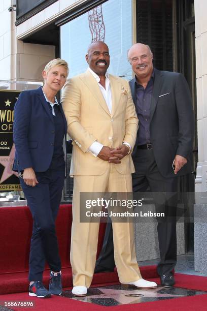 Ellen DeGeneres, Steve Harvey and Dr. Phil McGraw attend the ceremony honoring Steve Harvey with a Star on The Hollywood Walk of Fame held on May 13,...