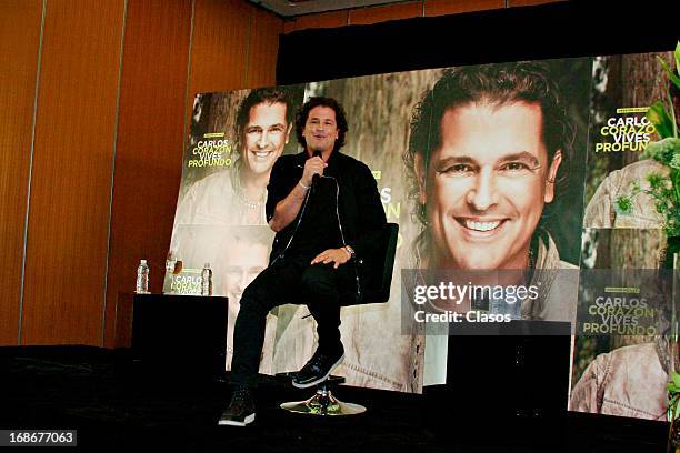 The Colombian singer Carlos Vives talks during the presentation of his new álbum Corazon Profundo at Presidente Hotel on May 13, 2013 in Mexico City,...