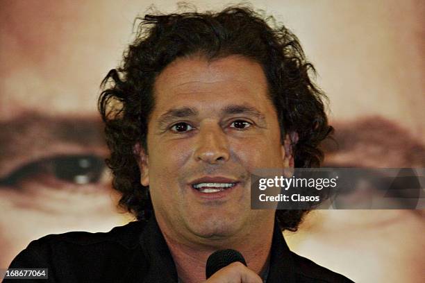 The Colombian singer Carlos Vives talks during the presentation of his new álbum Corazon Profundo at Presidente Hotel on May 13, 2013 in Mexico City,...