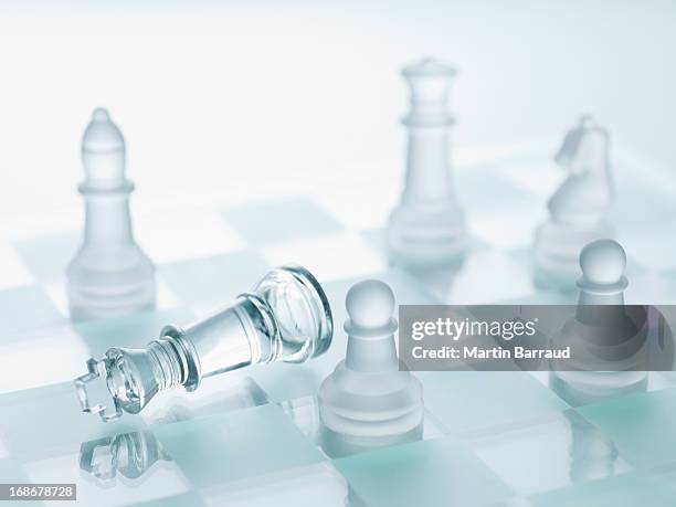 close up of glass chess pieces - bishop chess stock pictures, royalty-free photos & images