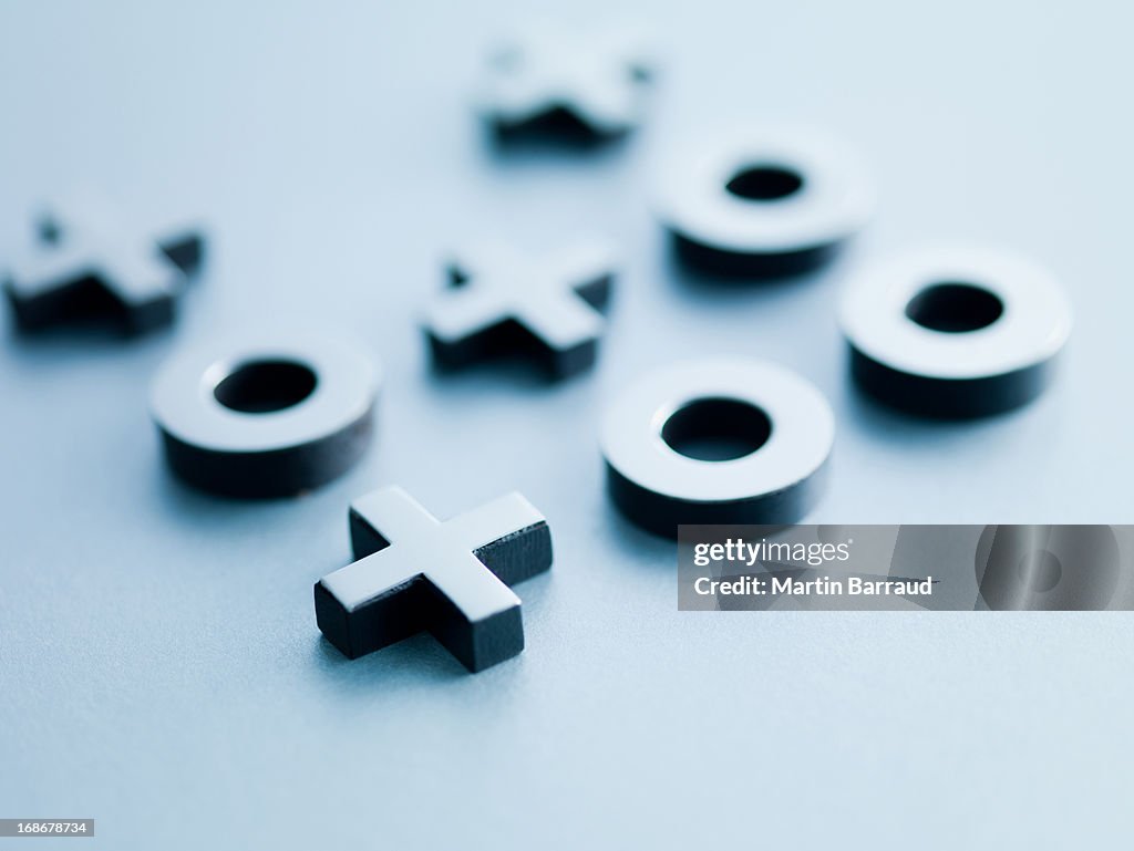 Metal tic-tac-toe game pieces