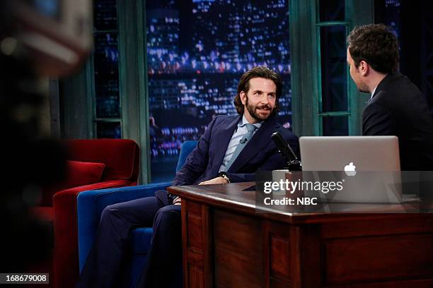 Episode 834 -- Pictured: Bradley Cooper with host Jimmy Fallon during an interview on May 13, 2013 --